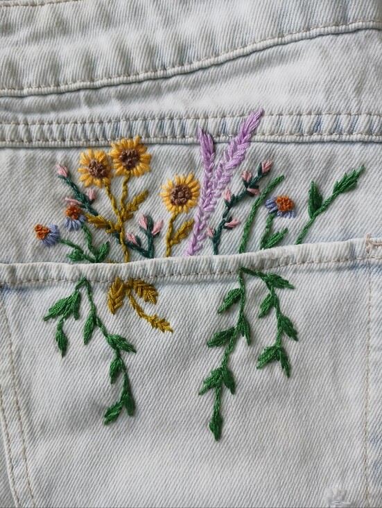 Rewash Pants - Women's acid wash denim cutoff shorts with hand stitched embroidery